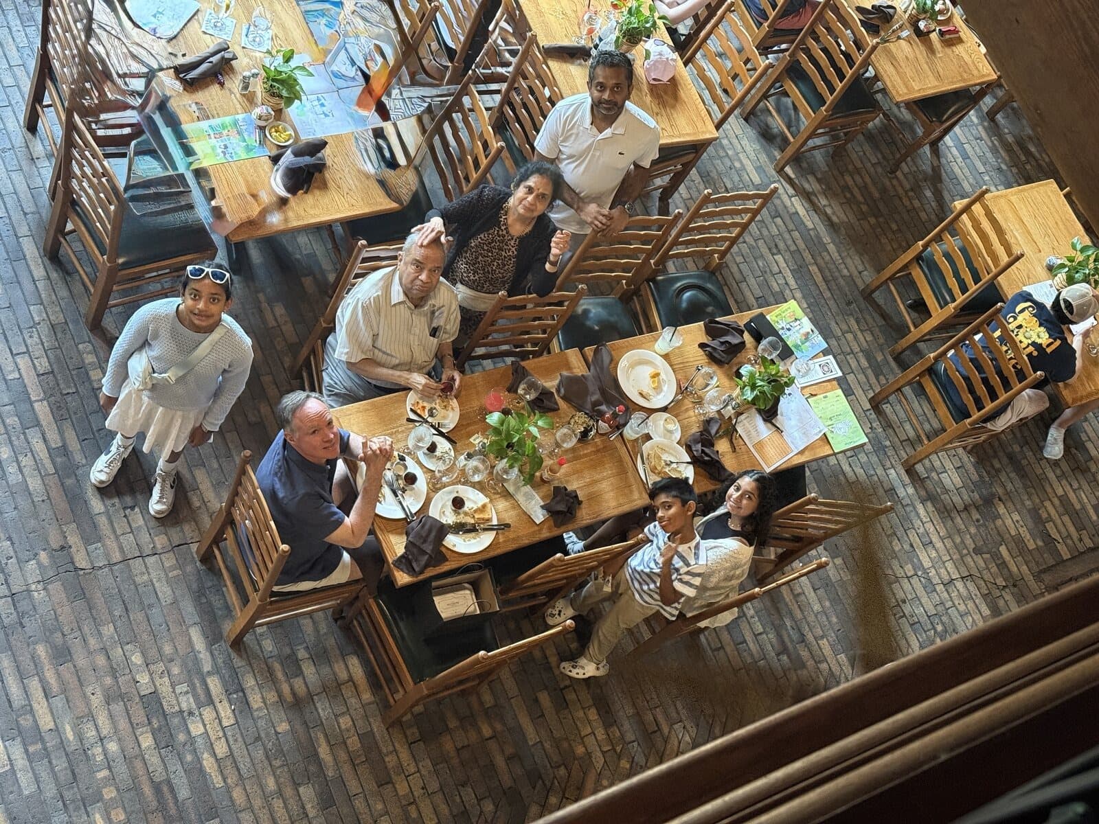 Mamata with her family around a table